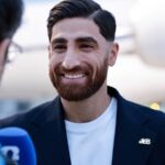 Joueurs iraniens avec pin's 168 à la Coupe du Monde 2026